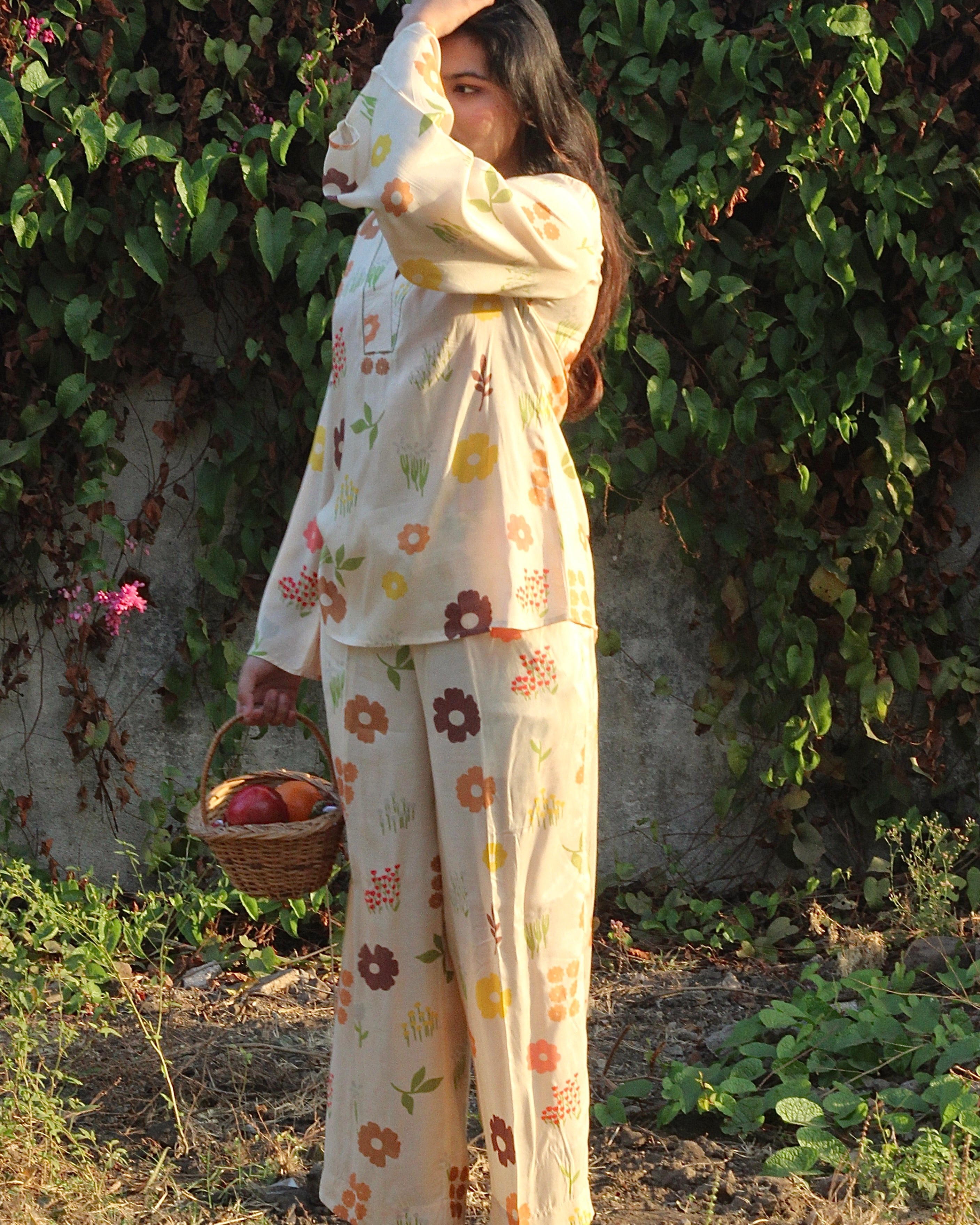 Fashionable pastel outfit with V-neck top and long pants