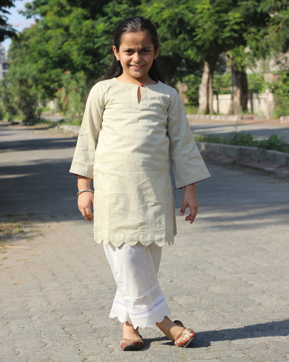 Pihu Pista green kurta with white pants