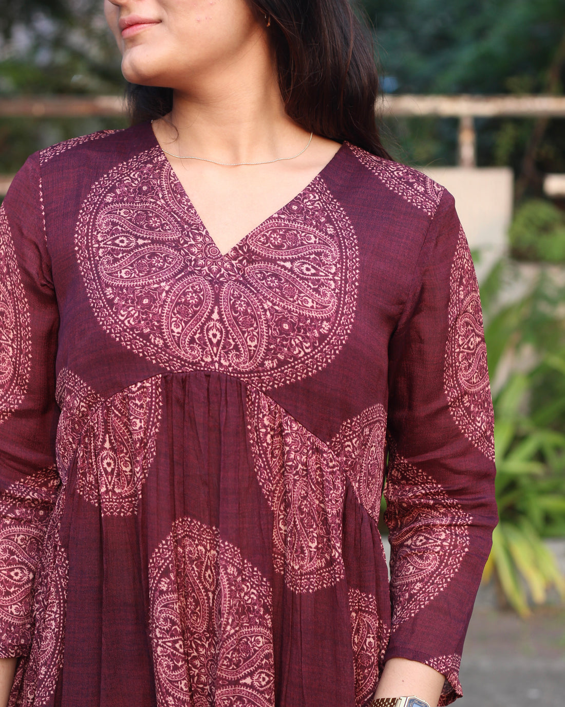Close-up of the dark grey Alia Cut Kurta showing the detailed circular print and the elegant V-neck design