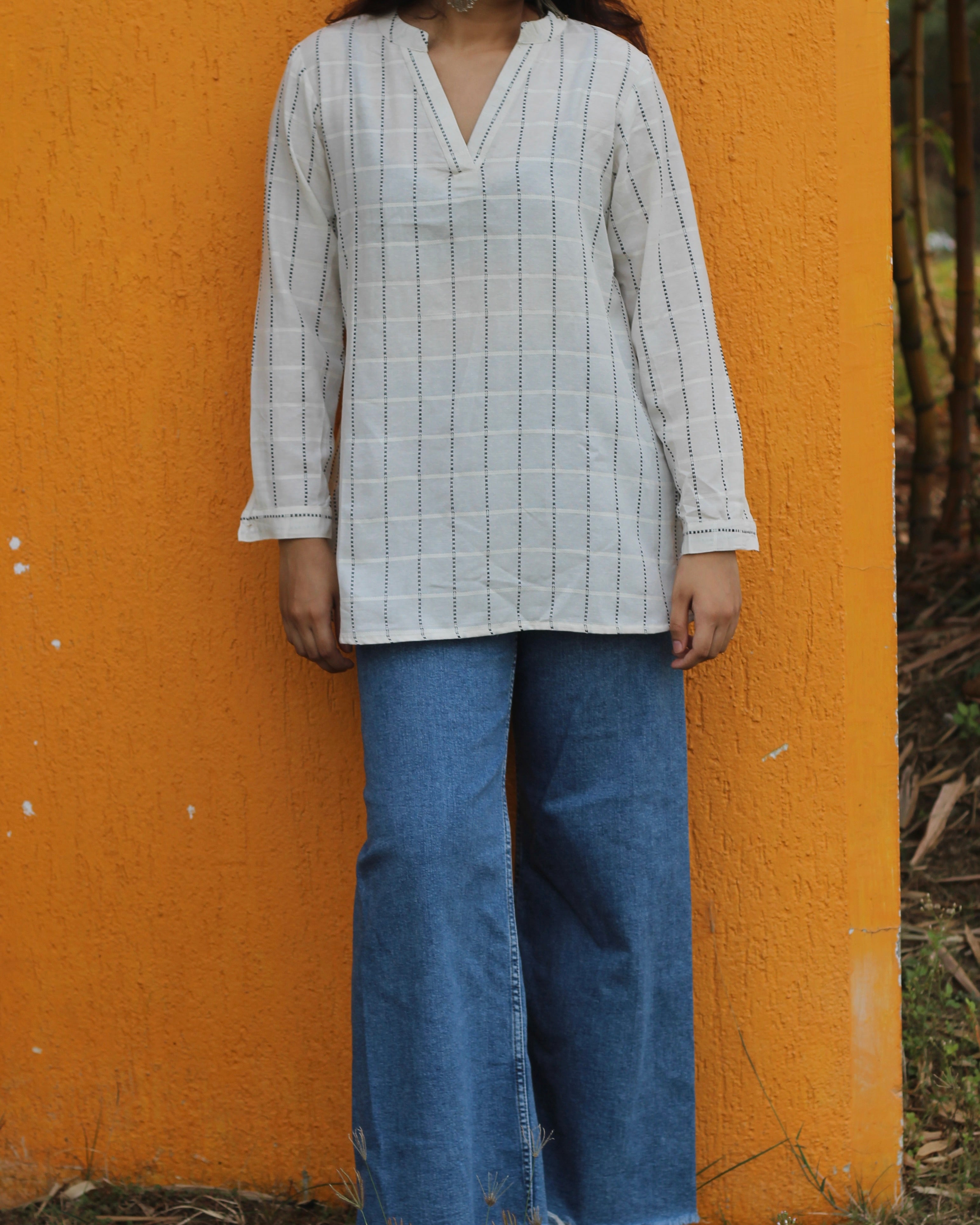 White handloom cotton short Kurta with V-neck and long sleeves, featuring elegant stripes, perfect for pairing with jeans