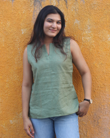 Premium linen sleeveless short kurta in Sage green, perfect for pairing with wide leg jeans for a brunch or casual workwear