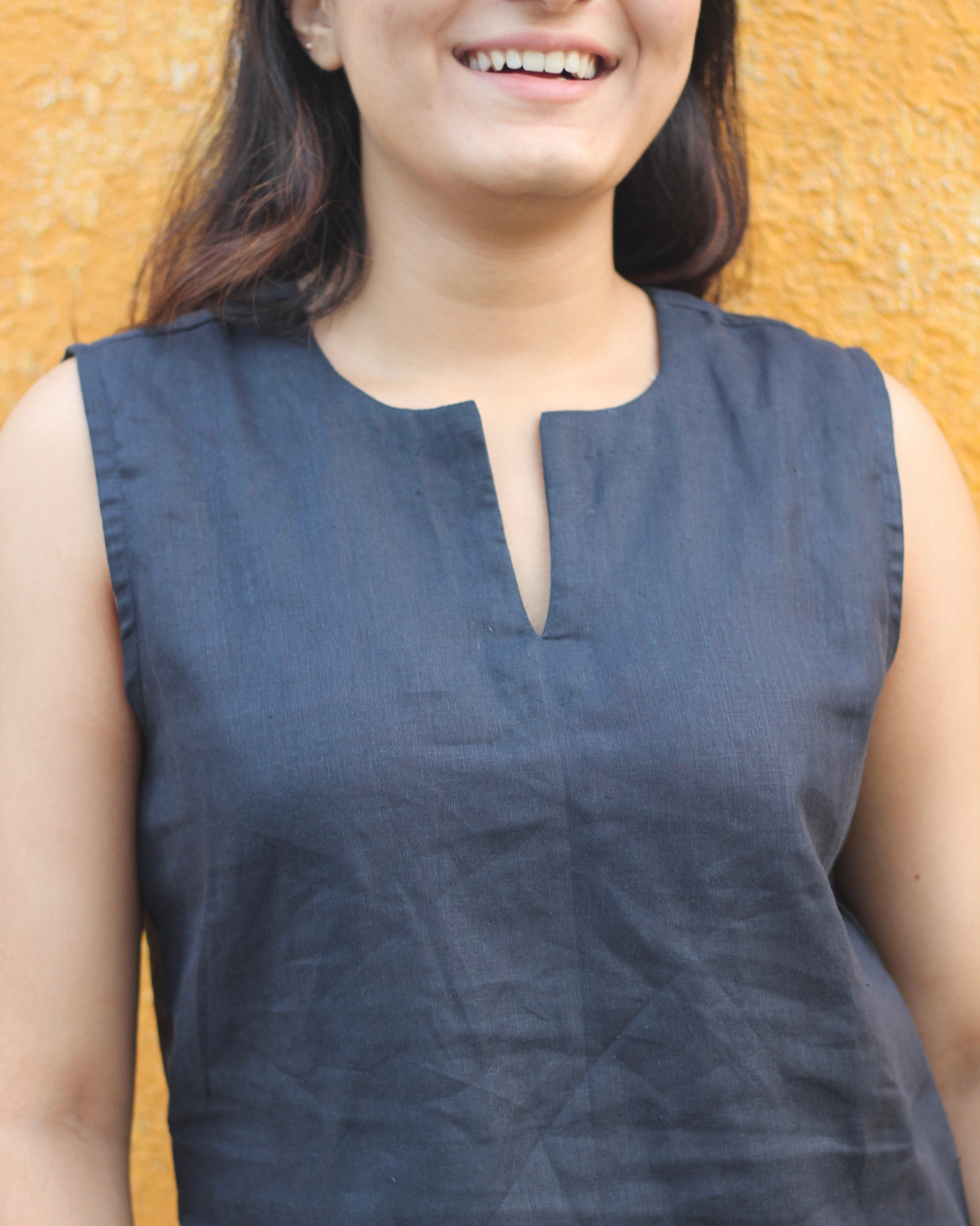 Premium linen sleeveless short kurta in Navy Blue, perfect for pairing with wide leg jeans for a brunch or casual workwear