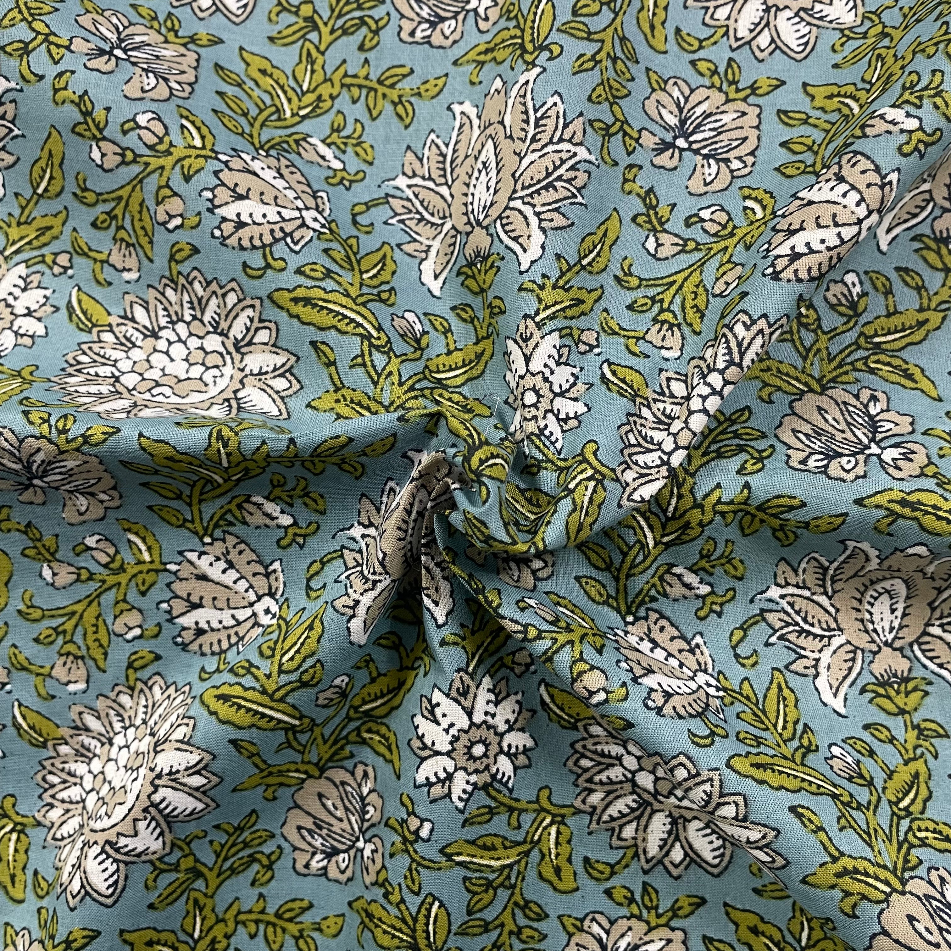 Timeless floral print on blue pure cotton fabric per meter