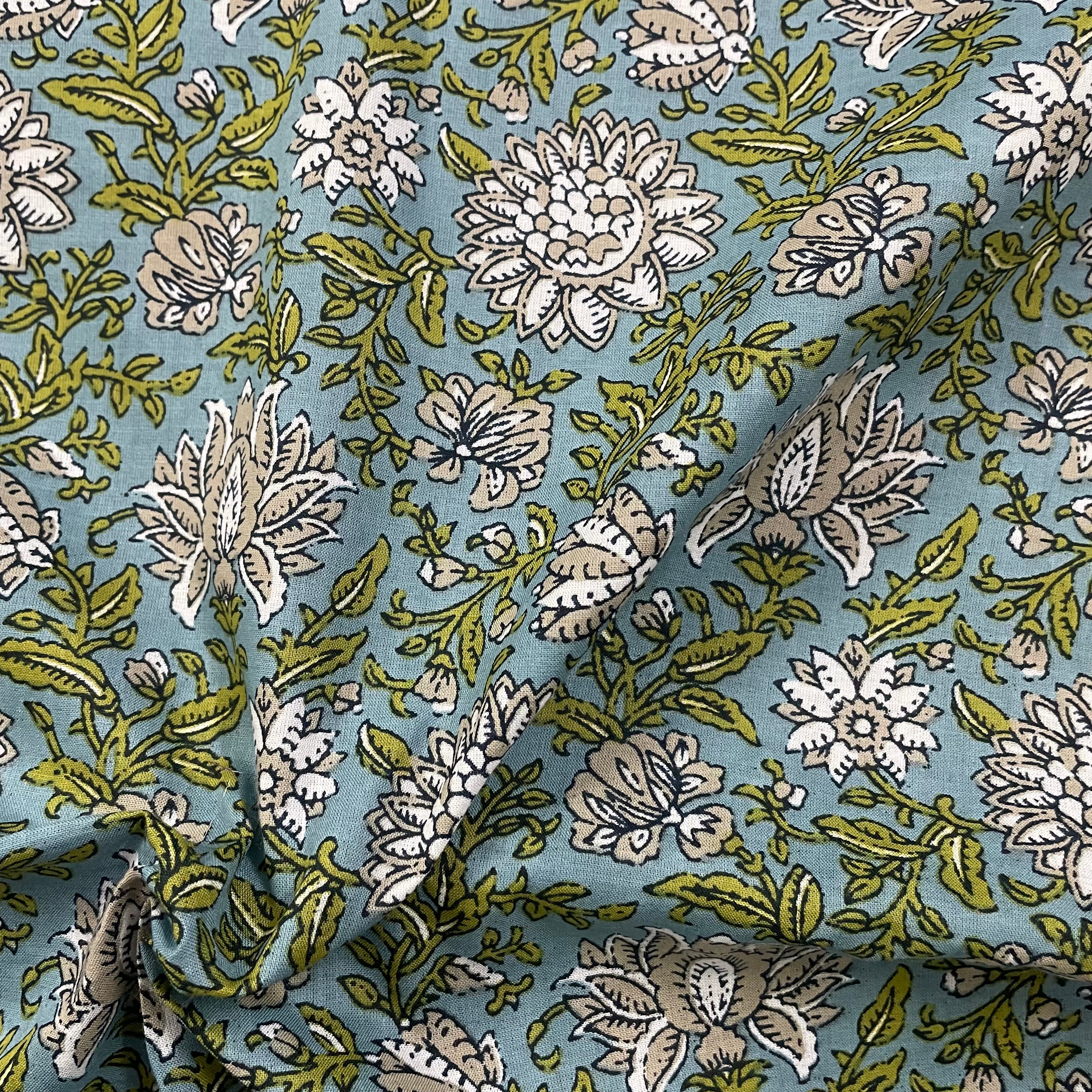 Timeless floral print on blue pure cotton fabric per meter