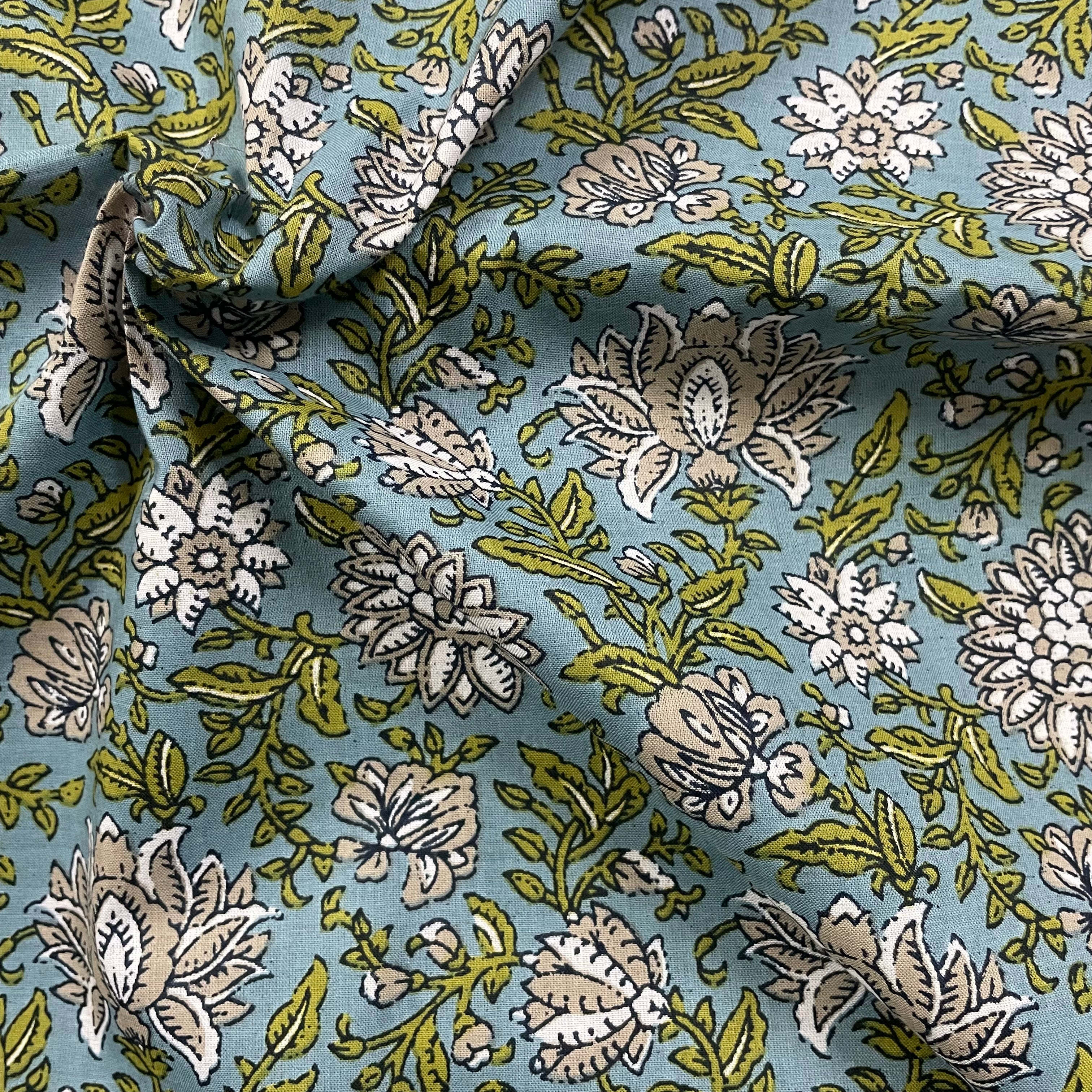 Timeless floral print on blue pure cotton fabric per meter
