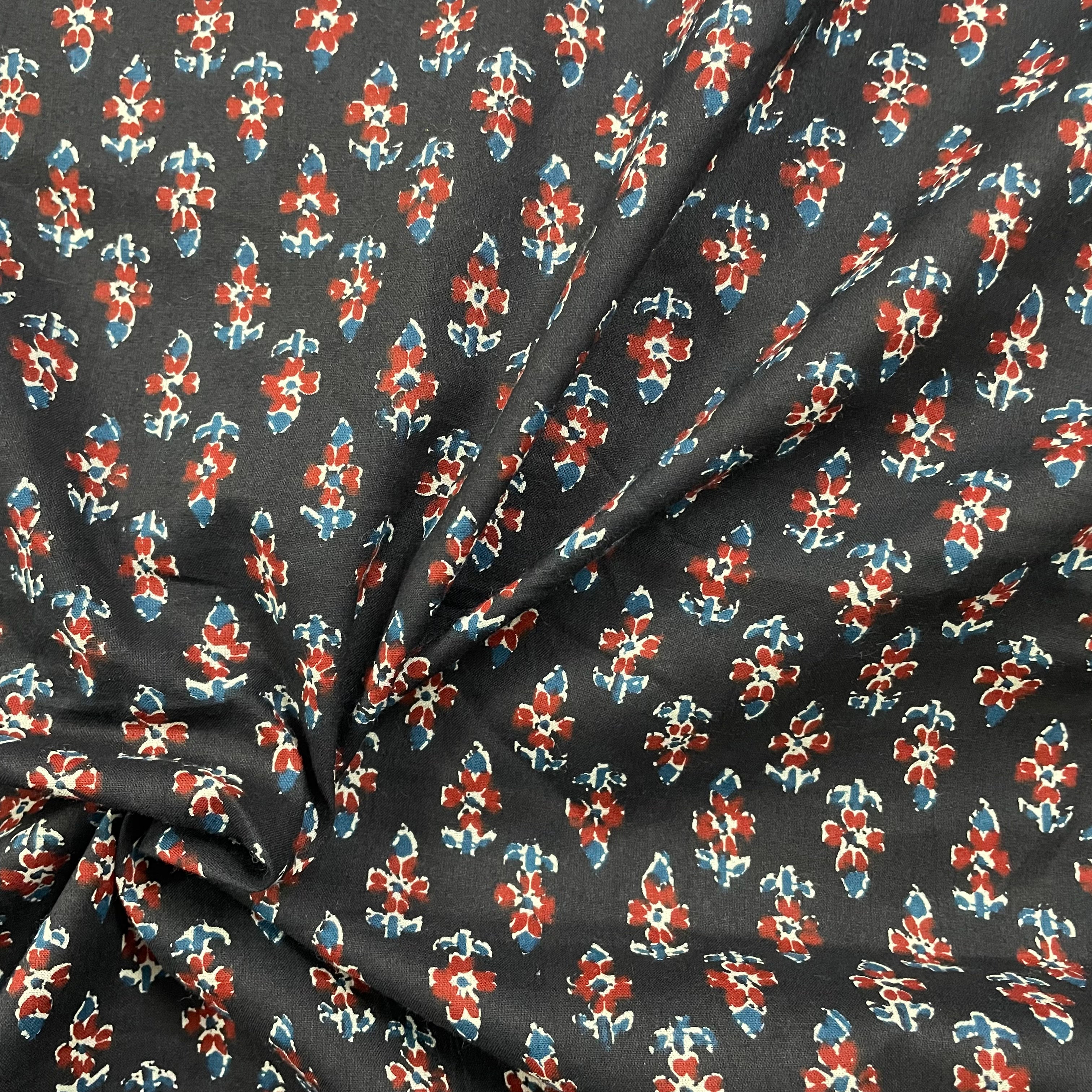Small booti print on black pure cotton fabric per meter