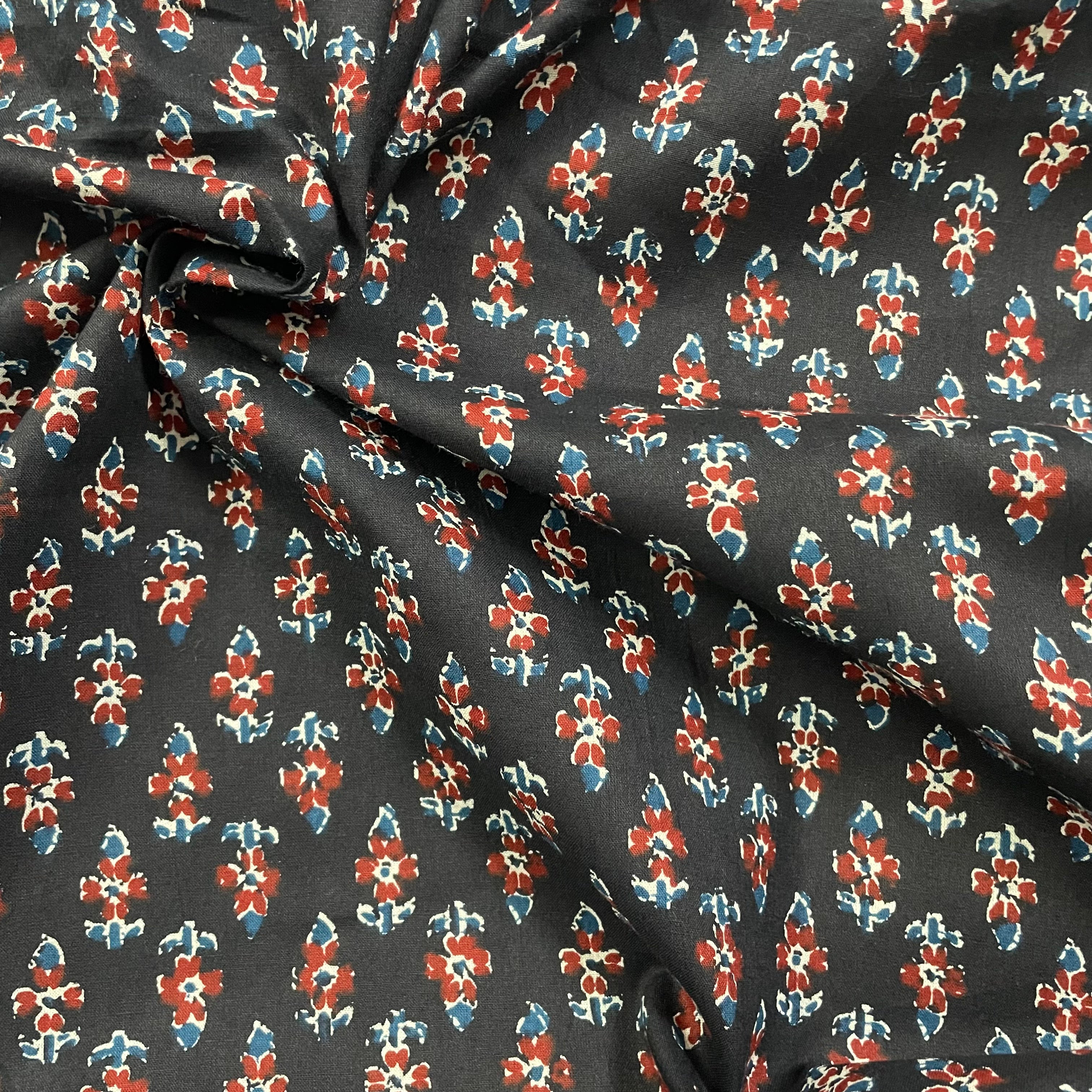 Small booti print on black pure cotton fabric per meter