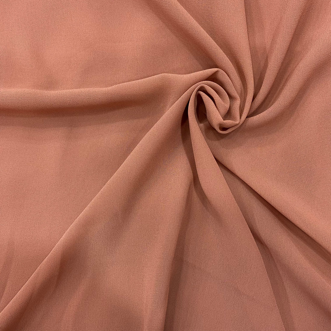 Textile material for dresses , saarees in brown shade