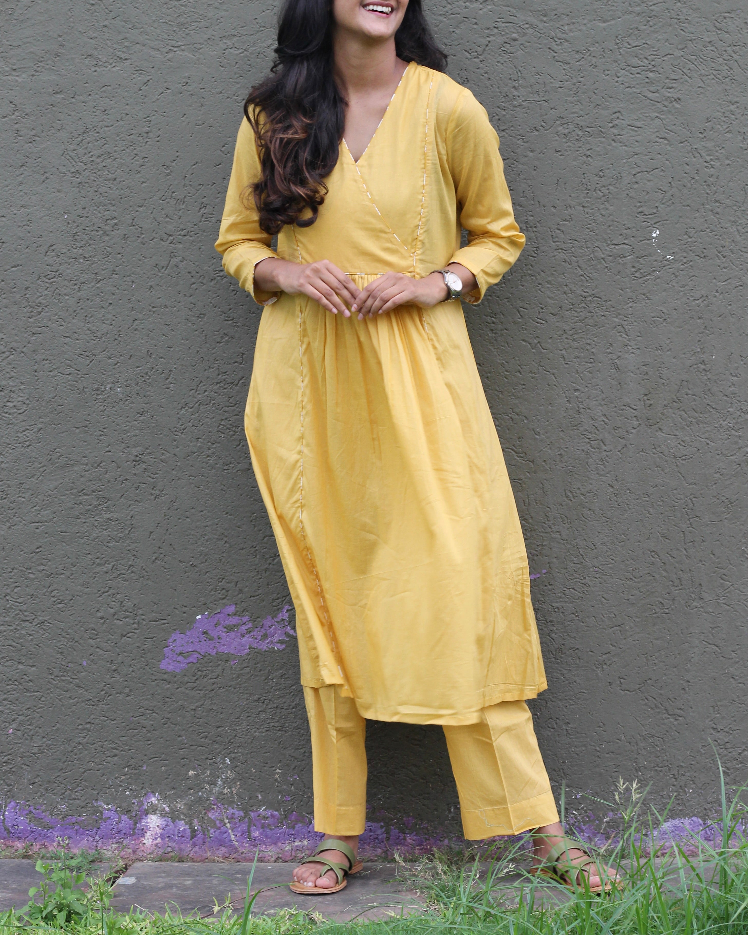 Solid dusty yellow mul cotton kurta pant set- Set of 2