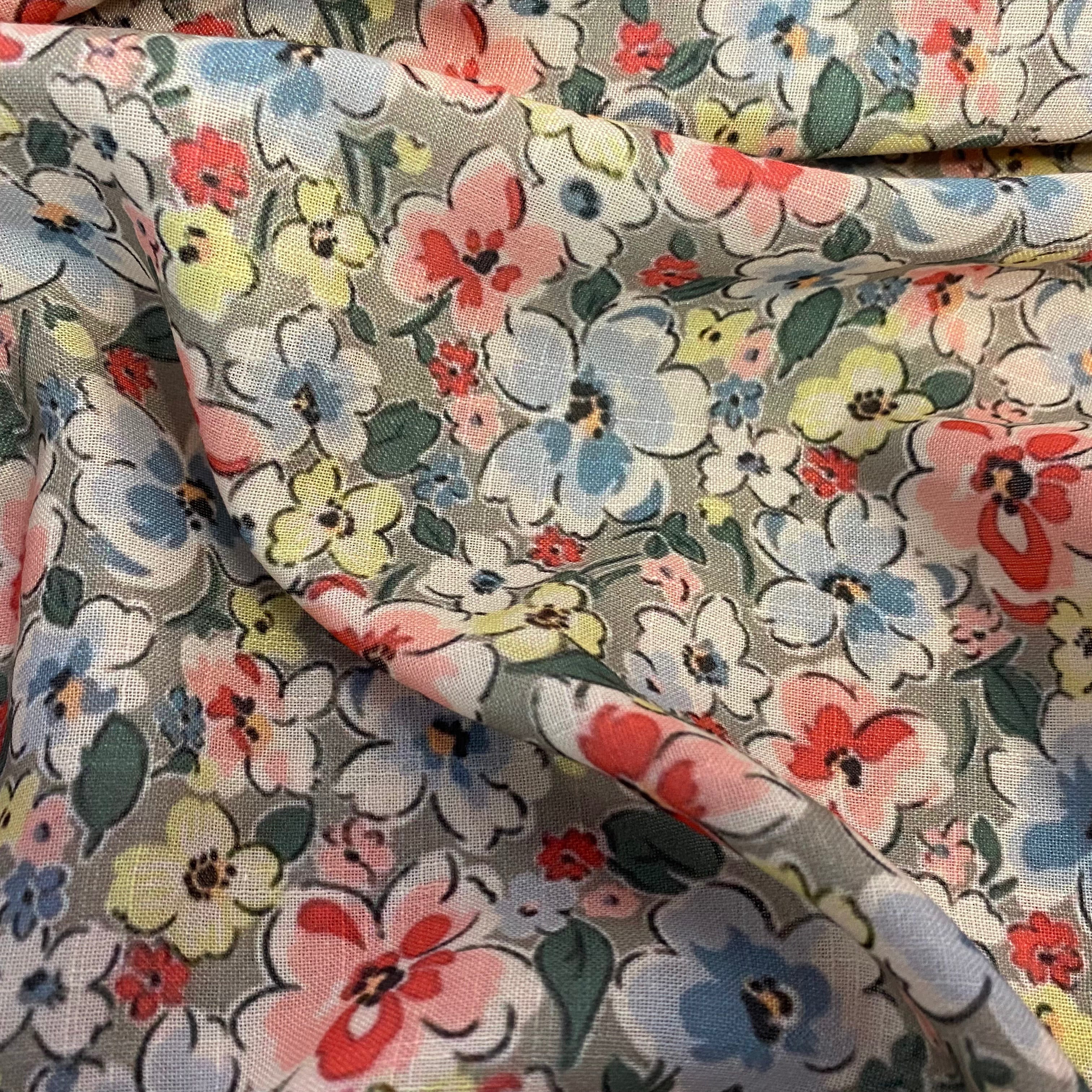 All over multicoloured florals on light grey cotton-linen per meter