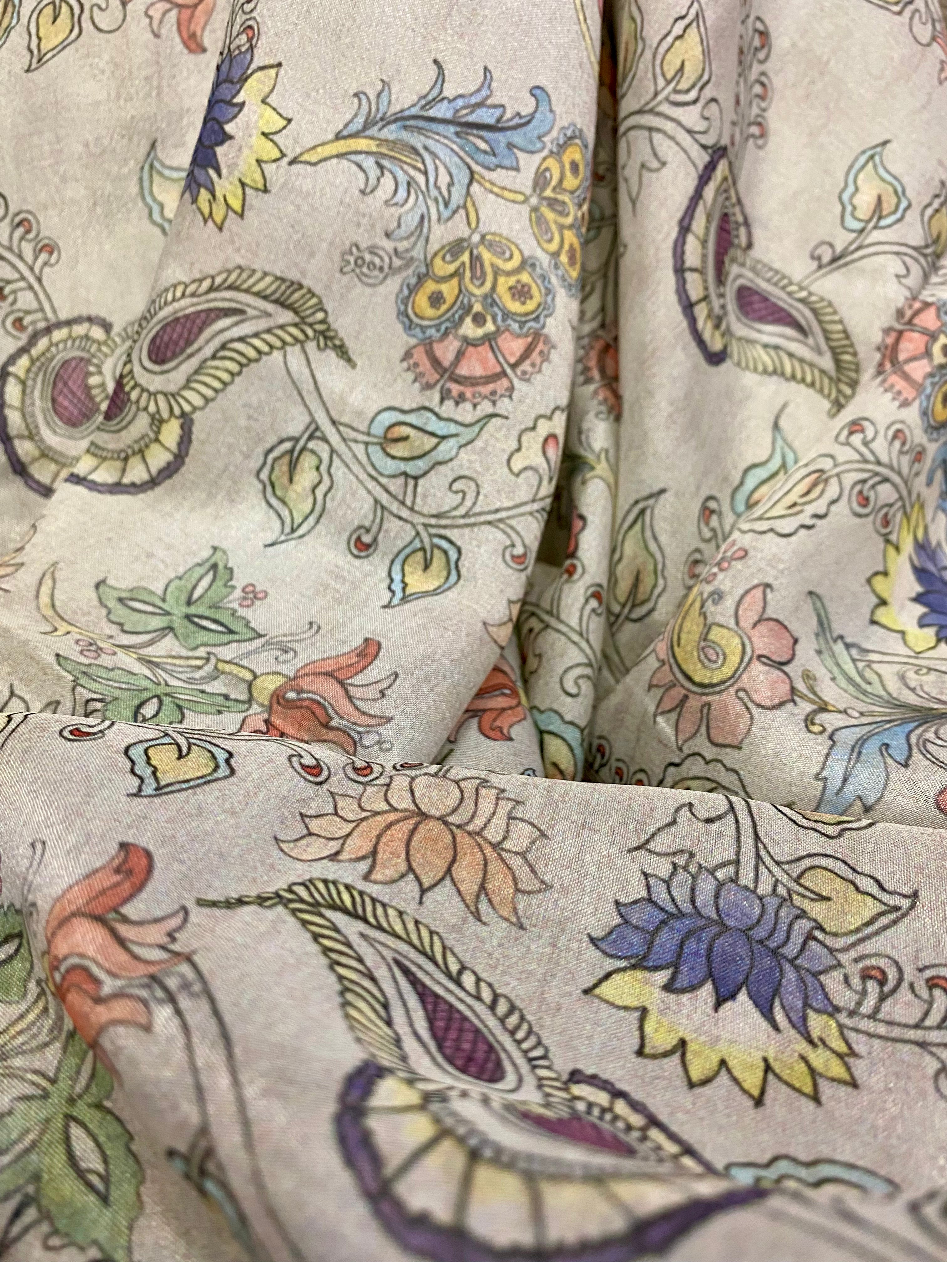 Pearl brown fabric with a multicoloured kalamkari design per meter