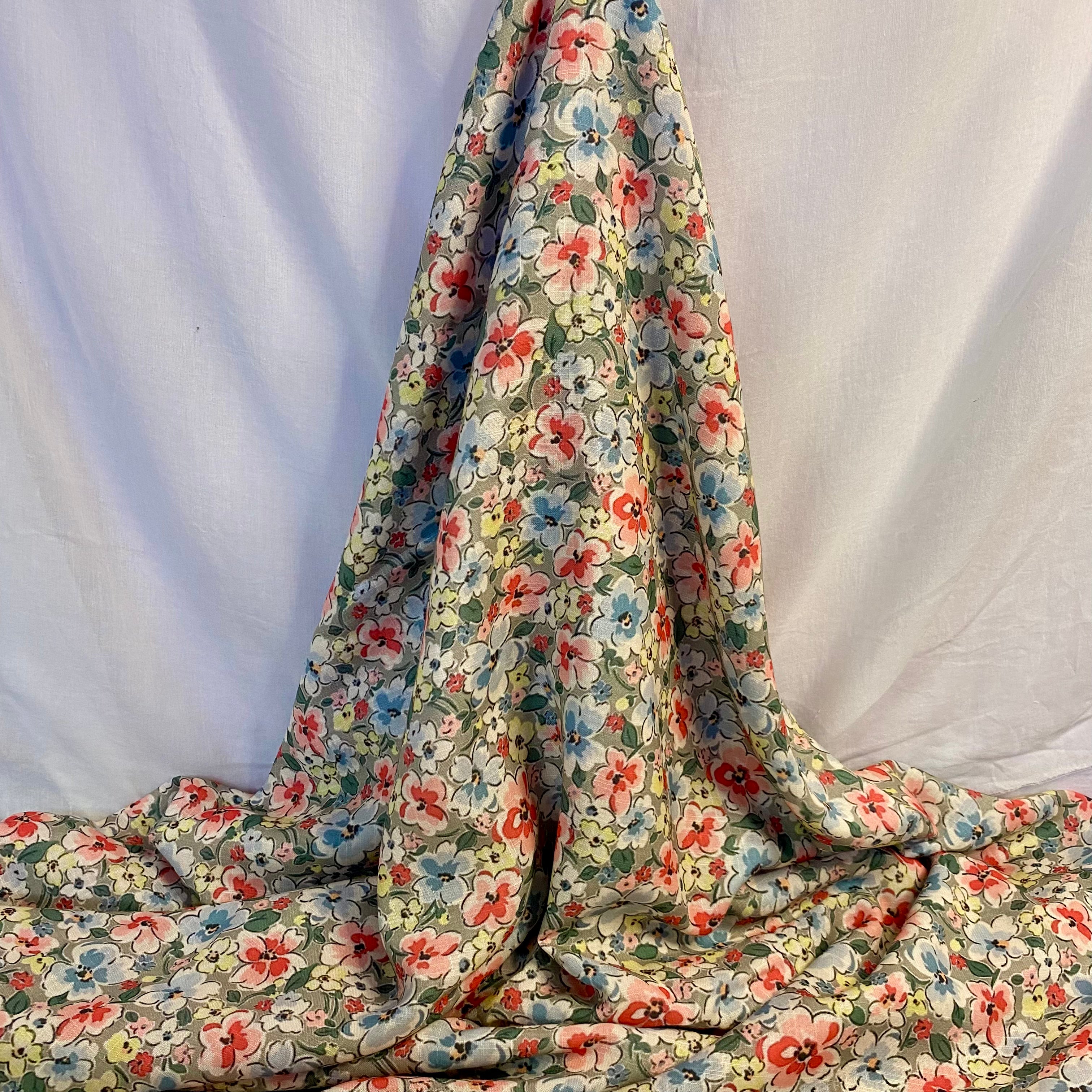 All over multicoloured florals on light grey cotton-linen per meter