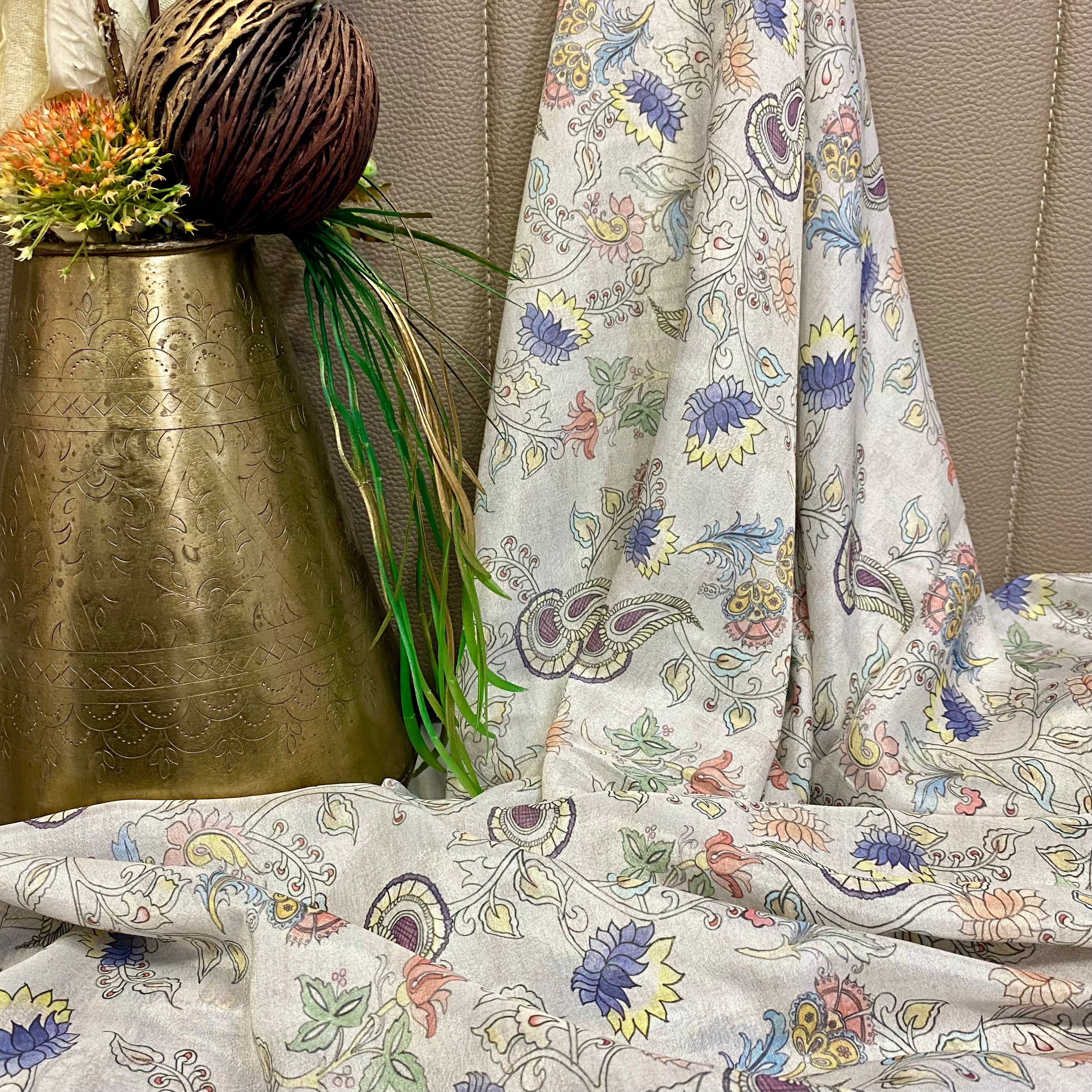 Pearl brown fabric with a multicoloured kalamkari design per meter