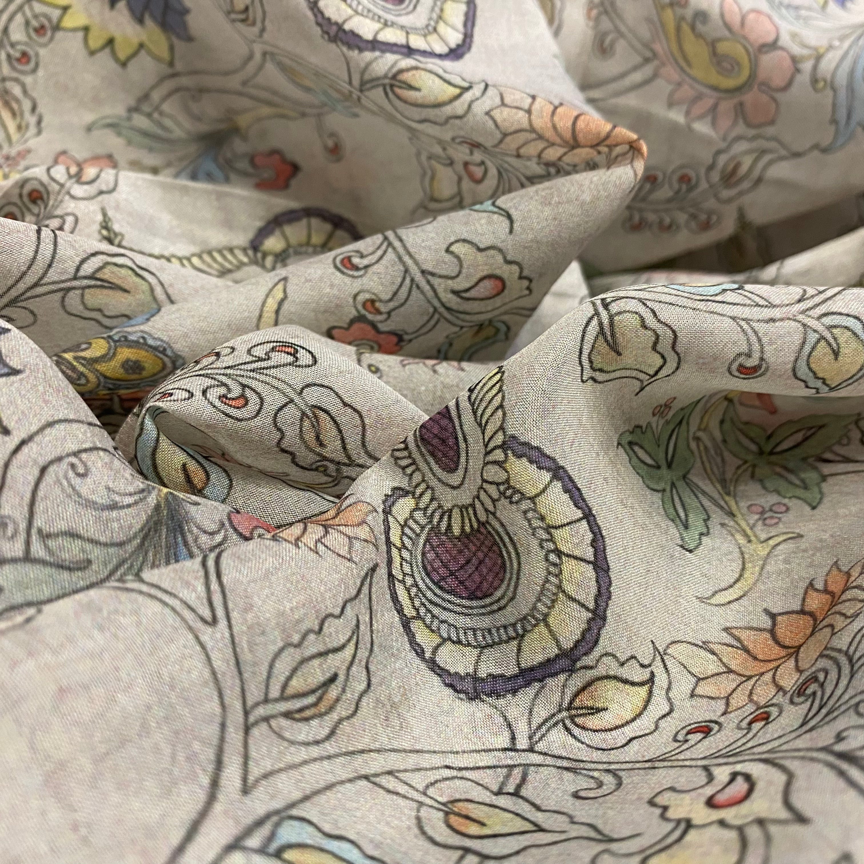 Pearl brown fabric with a multicoloured kalamkari design per meter