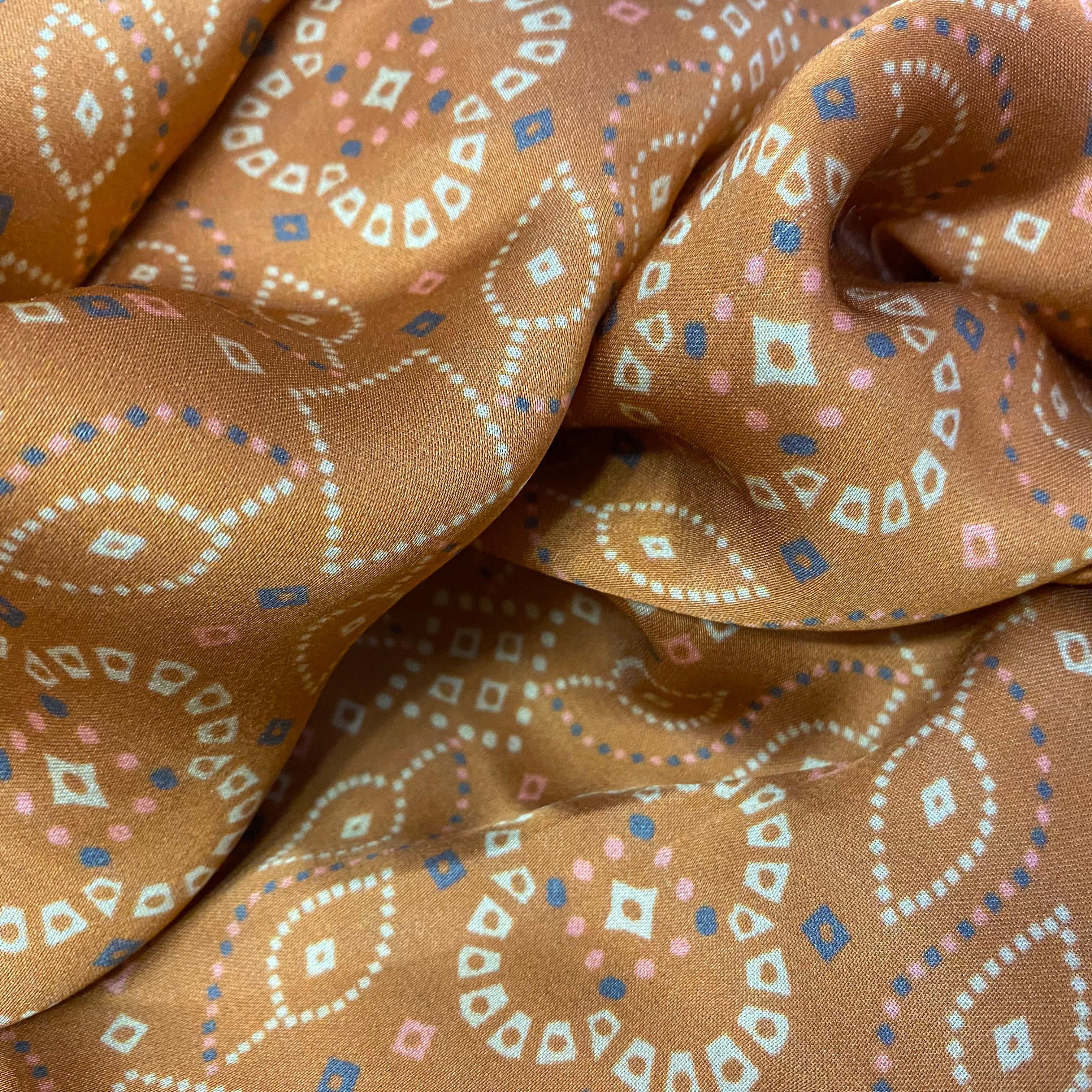 Abstract Indian Brown shade print on Modal Satin fabric per meter