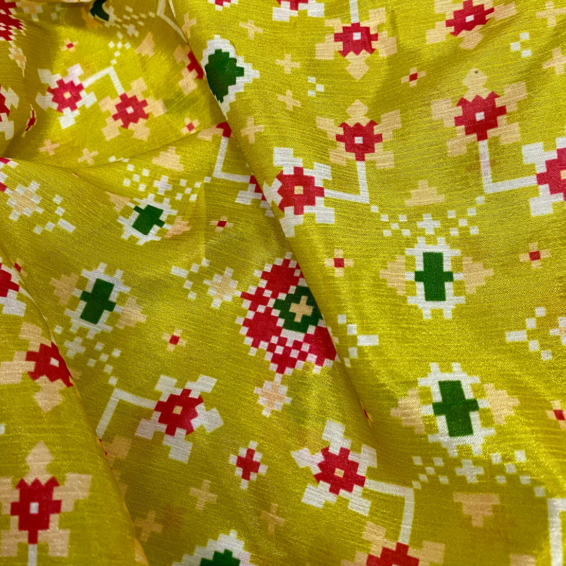 Gracious Green Patola print on Chinon fabric per meter
